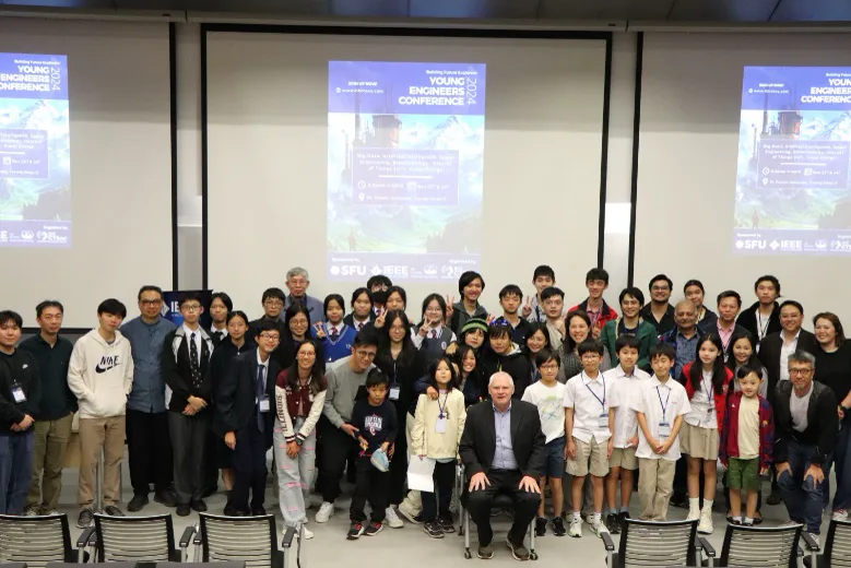 Young engineers and mentors together at a research conference